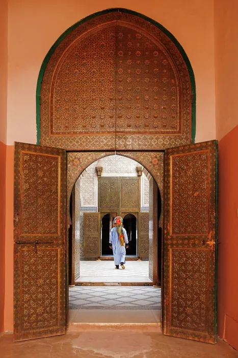 Framed Print : Berber man walking through the courtyard of the royal palace of the Kasbah of Telouet, Atlas Mountains, Morocco Framed Print : Berber man walking through the courtyard of the royal palace of the Kasbah of Telouet, Atlas Mountains, Morocco