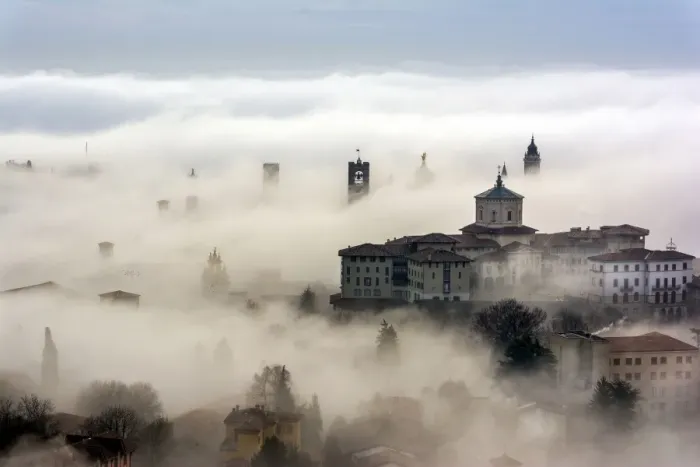 Framed Print : Bergamo, Lombardy, Italy. Foggy sunrise over high city Framed Print : Bergamo, Lombardy, Italy. Foggy sunrise over high city