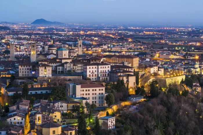 Framed Print : Bergamo, Lombardy, Italy. High angle view over Upper Town (Citta Alta) at dusk Framed Print : Bergamo, Lombardy, Italy. High angle view over Upper Town (Citta Alta) at dusk