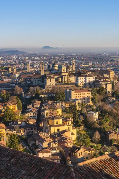 Framed Print : Bergamo, Lombardy, Italy. High angle view over Upper Town (Citta Alta) at sunset Framed Print : Bergamo, Lombardy, Italy. High angle view over Upper Town (Citta Alta) at sunset