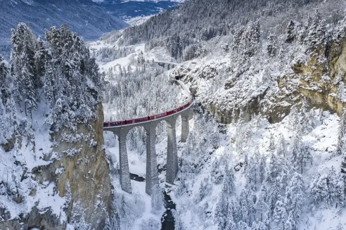 Framed Print : Bernina Express train on Landwasser viaduct in a snowy winter, Filisur Framed Print : Bernina Express train on Landwasser viaduct in a snowy winter, Filisur
