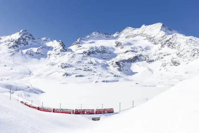 Framed Print : Bernina Express transit along Lago Bianco in winter, Bernina Pass, Engadin