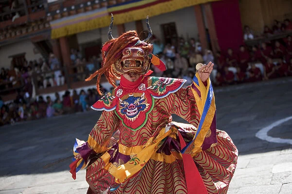 Bhutan. Participants at the tsechu in Wangdue Phodrang doing a performance