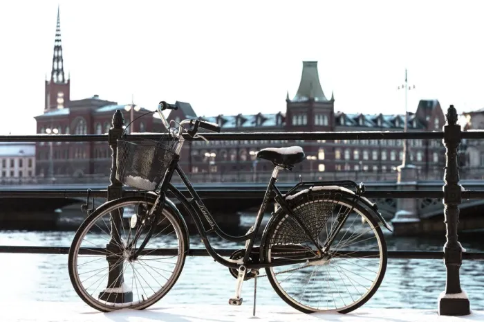 Framed Print : Bicycle near the river in Stockholm, winter day, snow. Sweden, Europe Framed Print : Bicycle near the river in Stockholm, winter day, snow. Sweden, Europe