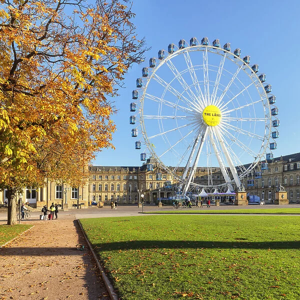 Big wheel at Schlossplatz Square with New Palace in autumn, Stuttgart, Baden-Wurttemberg, Germany