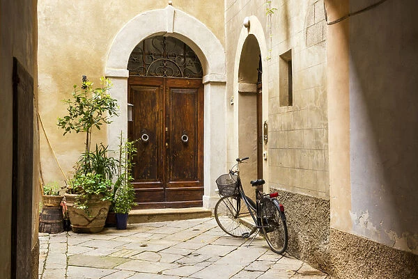Bike in Courtyard, Pienza, Tuscany, Italy