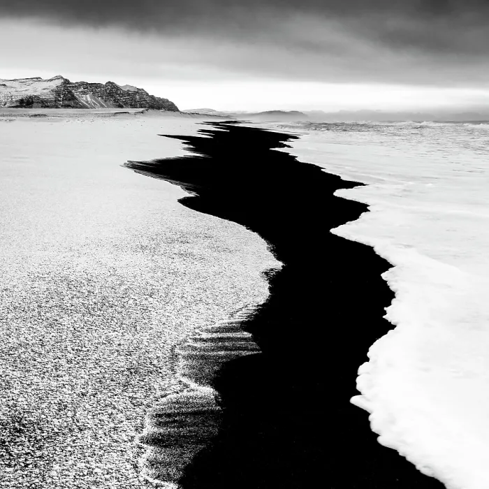 Framed Print : Black sand beach fringed by snow and surf, near Jokulsarlon, South Iceland Framed Print : Black sand beach fringed by snow and surf, near Jokulsarlon, South Iceland