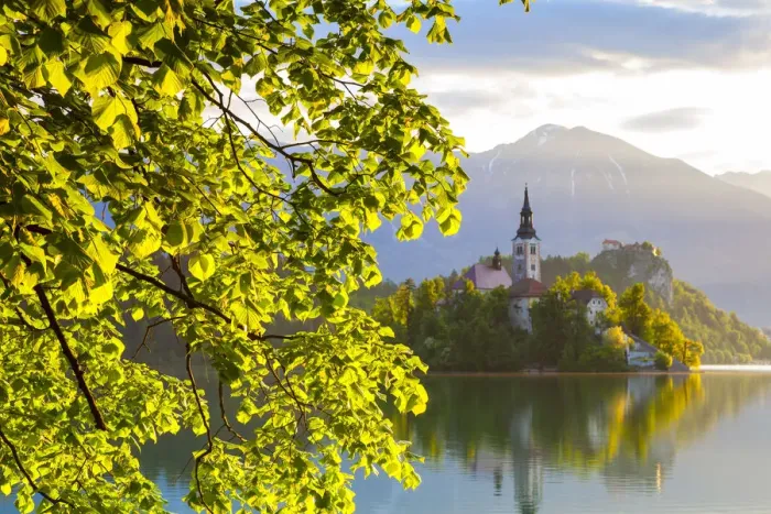 Framed Print : Bled Island with the Church of the Assumption illuminated at sunrise, Lake Bled, Bled