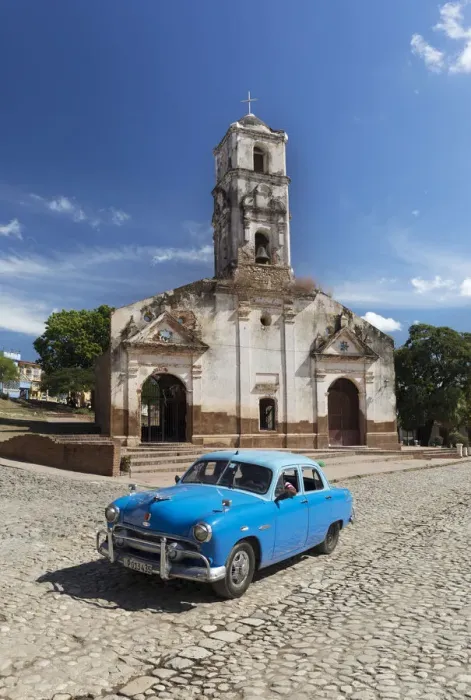 Framed Print : Blue classic car passes old church, Trinidad, Sancti Spiritus Province, Cuba Framed Print : Blue classic car passes old church, Trinidad, Sancti Spiritus Province, Cuba