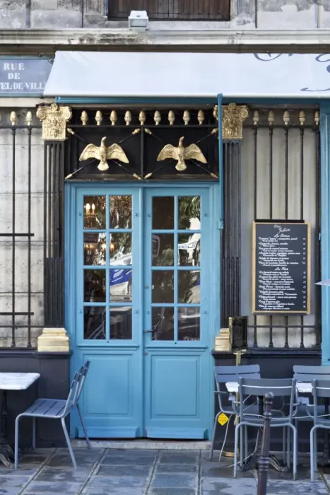 Framed Print : Blue doors of cafe, Marais District, Paris, France Framed Print : Blue doors of cafe, Marais District, Paris, France