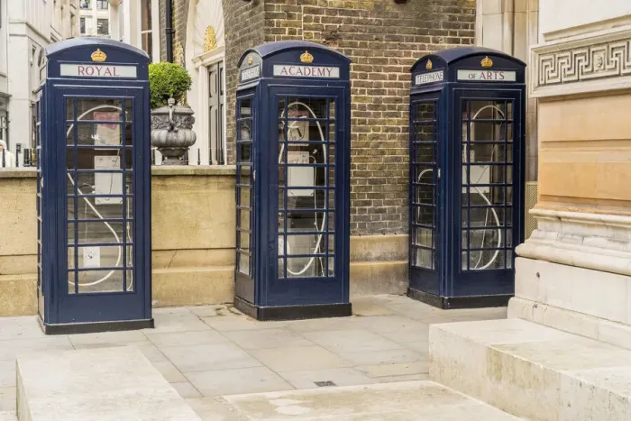 Framed Print : Three blue phone boxs outside the Royal Academy of Arts, designed by Max Boyla, Mayfair, London, England, UK Framed Print : Three blue phone boxs outside the Royal Academy of Arts, designed by Max Boyla, Mayfair, London, England, UK