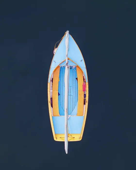 Framed Print : A blue sailboat at rest on Cape Cod, Massachusetts. I took the photo directly overhead using a drone for this angle and contrast of color Framed Print : A blue sailboat at rest on Cape Cod, Massachusetts. I took the photo directly overhead using a drone for this angle and contrast of color