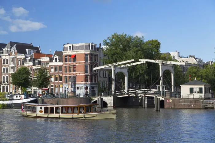 Framed Print : Boat on Amstel River, Amsterdam, Netherlands Framed Print : Boat on Amstel River, Amsterdam, Netherlands