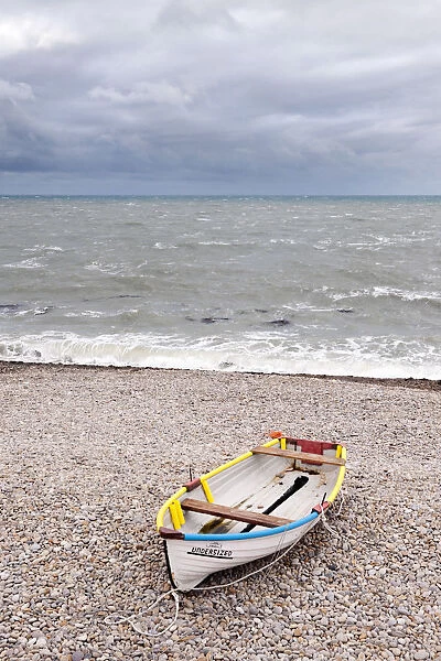 Boat on Chesil Beach, Dorset, UK