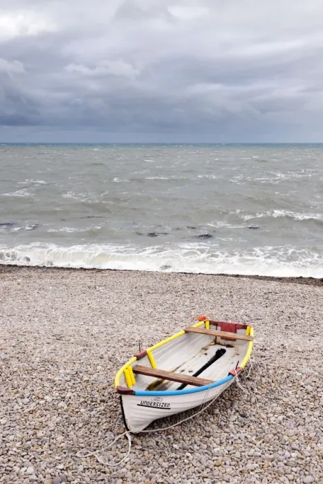 Framed Print : Boat on Chesil Beach, Dorset, UK
