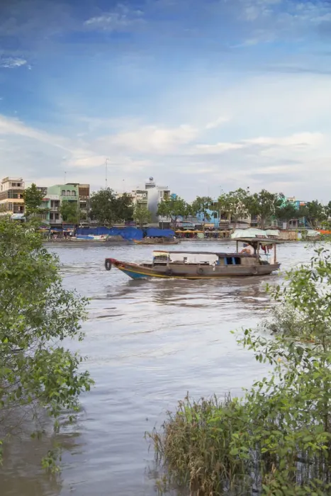 Framed Print : Boat passing along Ben Tre River, Ben Tre, Mekong Delta, Vietnam Framed Print : Boat passing along Ben Tre River, Ben Tre, Mekong Delta, Vietnam