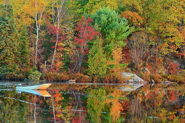 Boat on Raven Lake in autumn Raven Lake near Dorset, Ontario, Canada