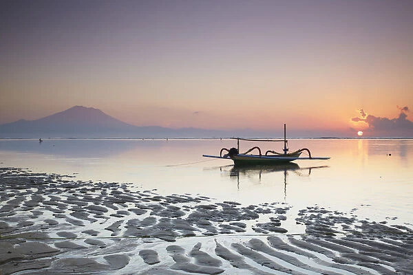Boat on Sanur beach at dawn, Bali, Indonesia