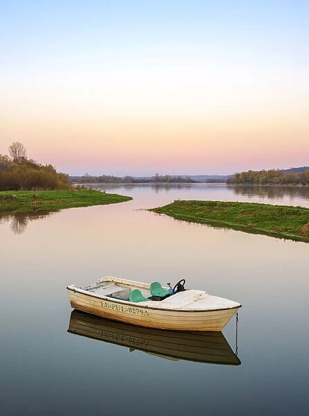 Boat on Vistula River at dusk, Janowiec, Lublin Voivodeship, Poland