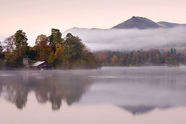Boathouse on a misty Derwent Water, Lake District National Park, Cumbria, England