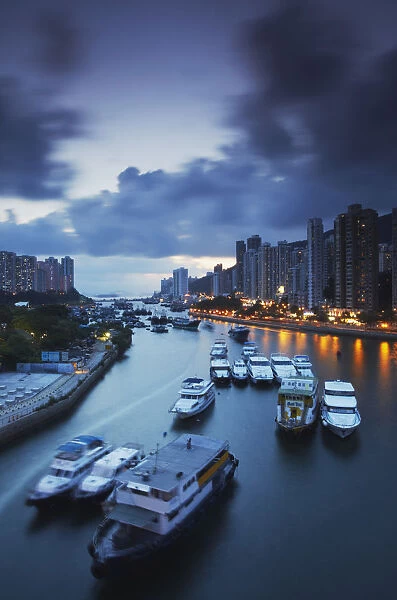 Boats in Aberdeen Harbour at dusk, Aberdeen, Hong Kong, China