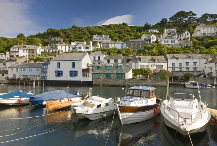 Framed Print : Boats and cottages surround the pretty harbour in the picture postcard Cornish fishing village of Polperro, Cornwall, England. Summer (June) 2010 Framed Print : Boats and cottages surround the pretty harbour in the picture postcard Cornish fishing village of Polperro, Cornwall, England. Summer (June) 2010