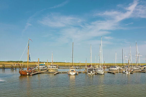 Boats in the harbor of Spiekeroog, East Frisian Islands, East Frisia, Lower Saxony, Germany