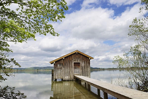 Boats house with jetty at lake Kochelsee, Kochel am See, Toelzer Land, Upper Bavaria