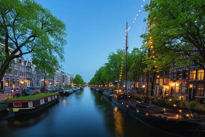 Framed Print : Boats and houses along Brouwersgracht canal at twilight, De Wallen, Amsterdam, Netherlands
