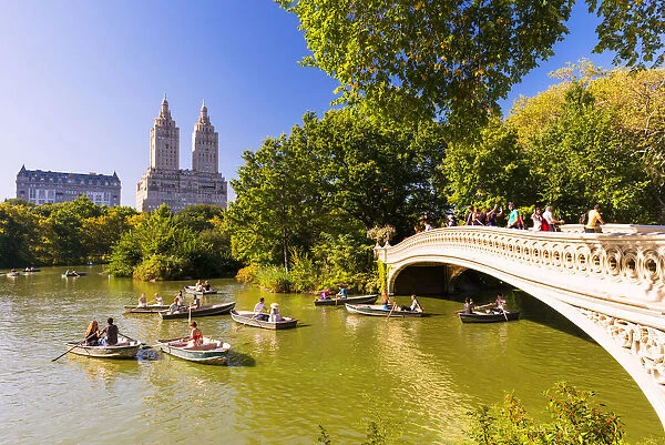 Boats on the Lake and Bow bridge in Central park, New York, USA