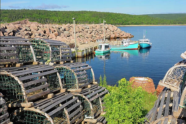 Boats and lobster traps in coastal village Neils Harbour Nova Scotia, Canada