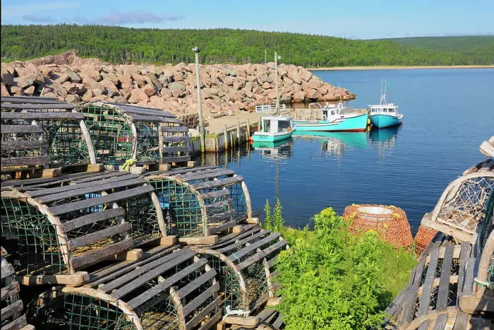 Framed Print : Boats and lobster traps in coastal village Neils Harbour Nova Scotia, Canada Framed Print : Boats and lobster traps in coastal village Neils Harbour Nova Scotia, Canada
