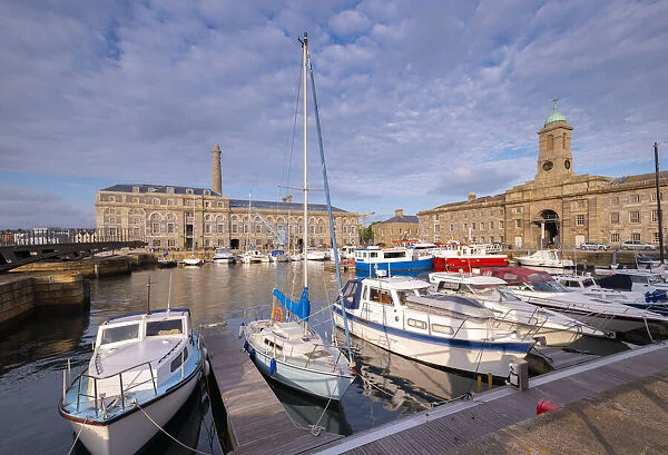 Boats moored in historic Royal William Yard on a summer evening, Plymouth, Devon, England