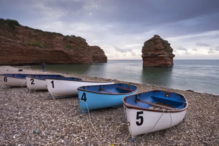Framed Print : Boats pulled up on the shingle at Ladram Bay on the Jurassic Coast, Devon, England