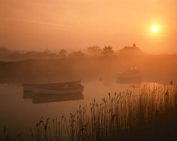Boats on River Alde at Sunrise, Snape, Suffolk, England