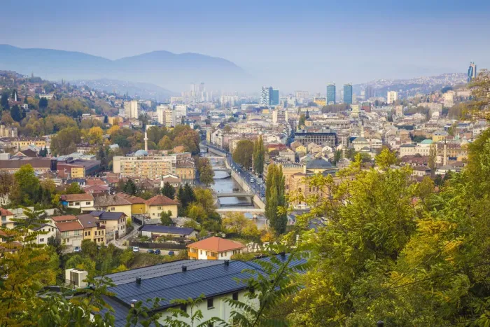 Framed Print : Bosnia and Herzegovina, Sarajevo, View of city and Miljacka River Framed Print : Bosnia and Herzegovina, Sarajevo, View of city and Miljacka River