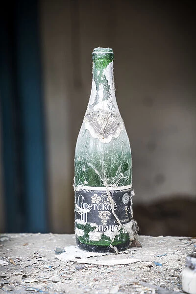 Bottle on window sill, Abandoned village inside the Chernobyl Exclusion Zone, Ukraine