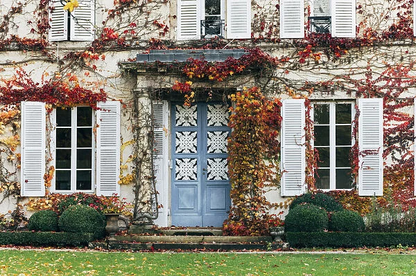 Bourgogne wine region (Burgundy), France, Europe. Autumn landscape, door and garden foliage