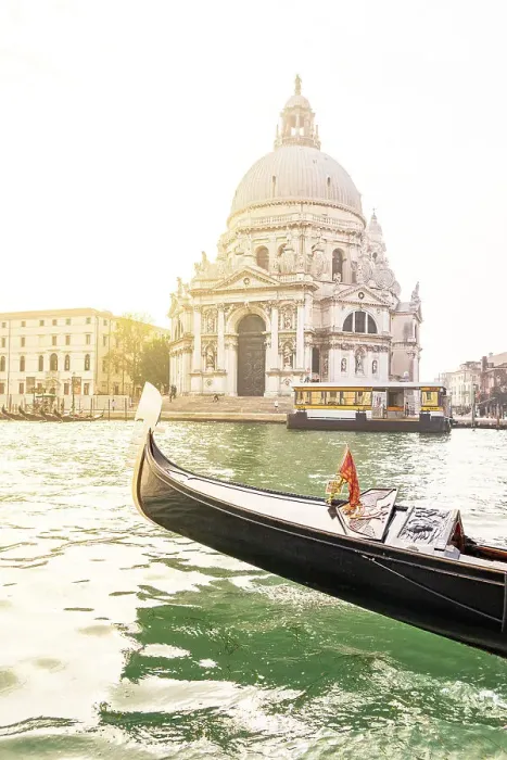 Framed Print : Bow of a gondola sailing in the Venetian Lagoon with Santa Maria della Salute Basilica on background, Venice, Veneto, Italy Framed Print : Bow of a gondola sailing in the Venetian Lagoon with Santa Maria della Salute Basilica on background, Venice, Veneto, Italy