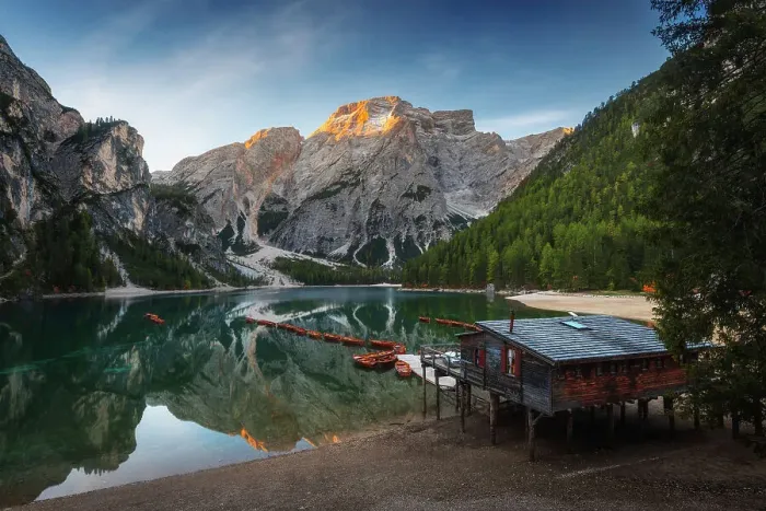 Framed Print : The Braies lake taking the first light of the day on a calm early autumn morning. Dolomites, Italy