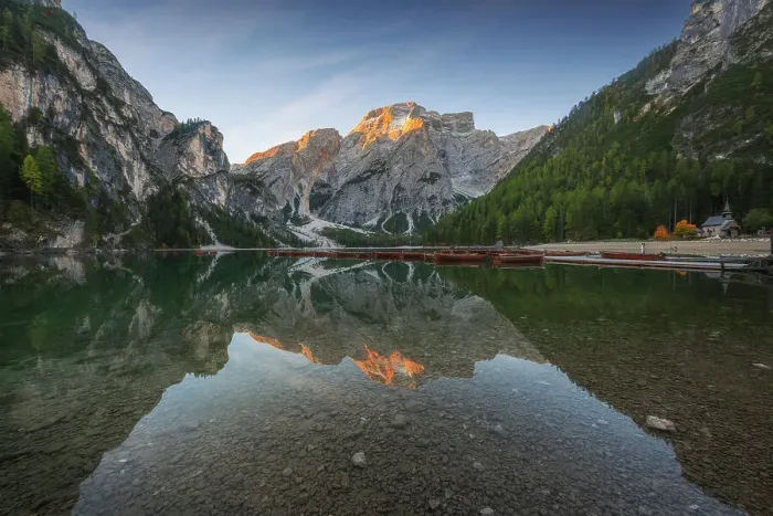 Framed Print : The Braies lake taking the first light of the day on a windy summer morning. Dolomites, Italy Framed Print : The Braies lake taking the first light of the day on a windy summer morning. Dolomites, Italy