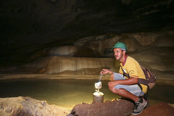 Brazil, Bahia, Chapada Diamantina, a guide in the Gruta da Lapa Doce caves in the