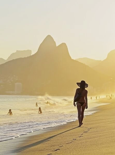 Brazil, City of Rio de Janeiro, Ipanema Beach and Morro Dois Irmaos at sunset