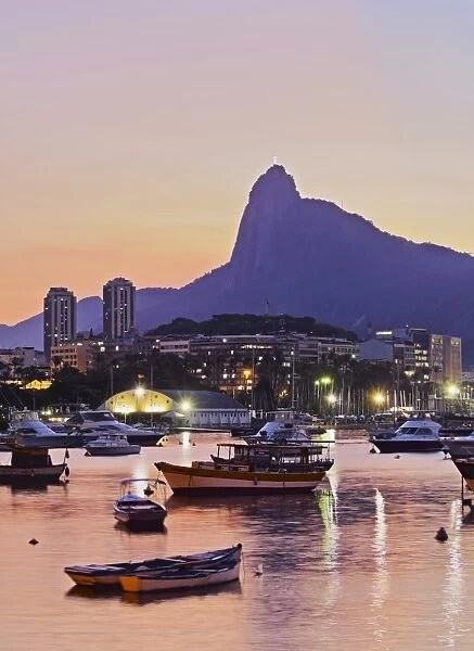 Brazil, City of Rio de Janeiro, Sunset over Botafogo Bay and Corcovado Mountain viewed
