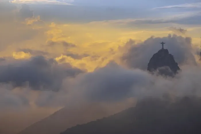 Framed Print : Brazil, Rio de Janeiro, Christ the Redeemer statue on Corcovado Hill surrounded by golden clouds at sundown Framed Print : Brazil, Rio de Janeiro, Christ the Redeemer statue on Corcovado Hill surrounded by golden clouds at sundown