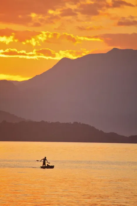 Framed Print : Brazil, Rio de Janeiro State, Angra dos Reis, Ilha Grande, a fisherman silhouetted Framed Print : Brazil, Rio de Janeiro State, Angra dos Reis, Ilha Grande, a fisherman silhouetted