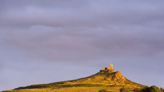 Framed Print : Brentor Church bathed in rich evening sunlight, Dartmoor National Park, Devon, England Framed Print : Brentor Church bathed in rich evening sunlight, Dartmoor National Park, Devon, England