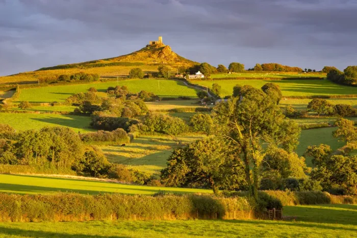 Framed Print : Brentor Church rising above rolling summer countryside, Dartmoor, Devon, England Framed Print : Brentor Church rising above rolling summer countryside, Dartmoor, Devon, England