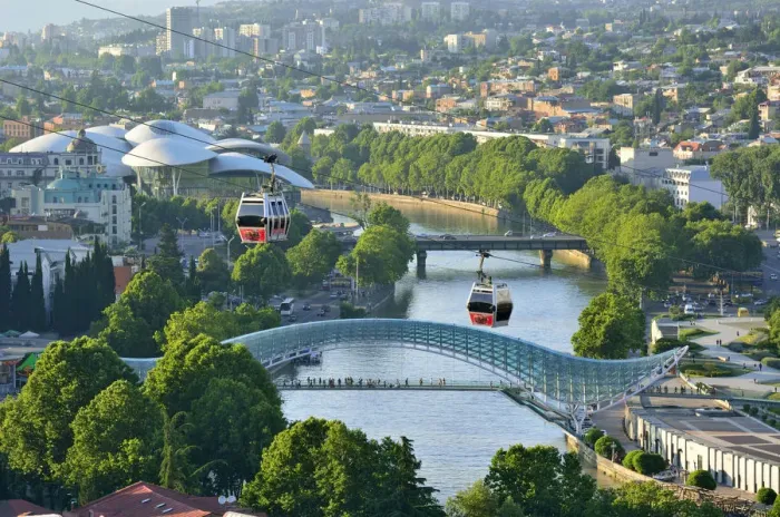 Framed Print : Bridge of Peace and the Mtkvari river. The famous Cable Car above. Tbilisi, Georgia Framed Print : Bridge of Peace and the Mtkvari river. The famous Cable Car above. Tbilisi, Georgia