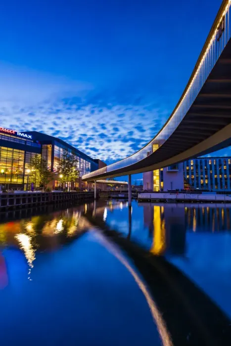 Framed Print : Bridge reflecting in the water canal and Fisketorvet shopping centre in the background by Framed Print : Bridge reflecting in the water canal and Fisketorvet shopping centre in the background by
